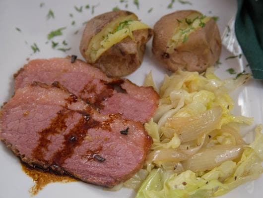 Baked Corned Beef with Sauteed Cabbage and Baked New Potatoes...