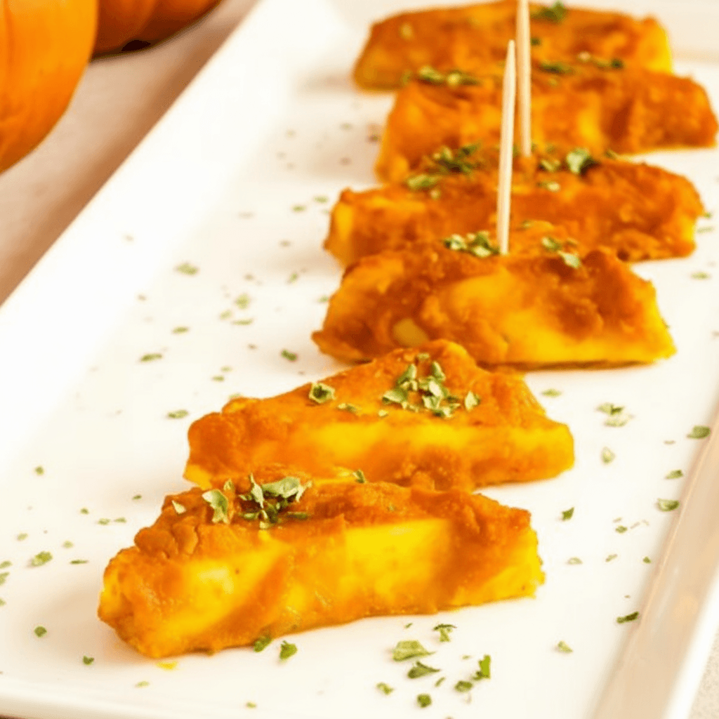 Baked paneer in pumpkin sauce