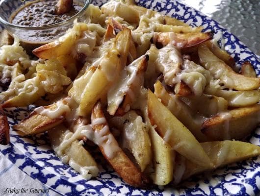 Baked Steak Fries with Melted Cheese and Cilantro Dipping Sauce